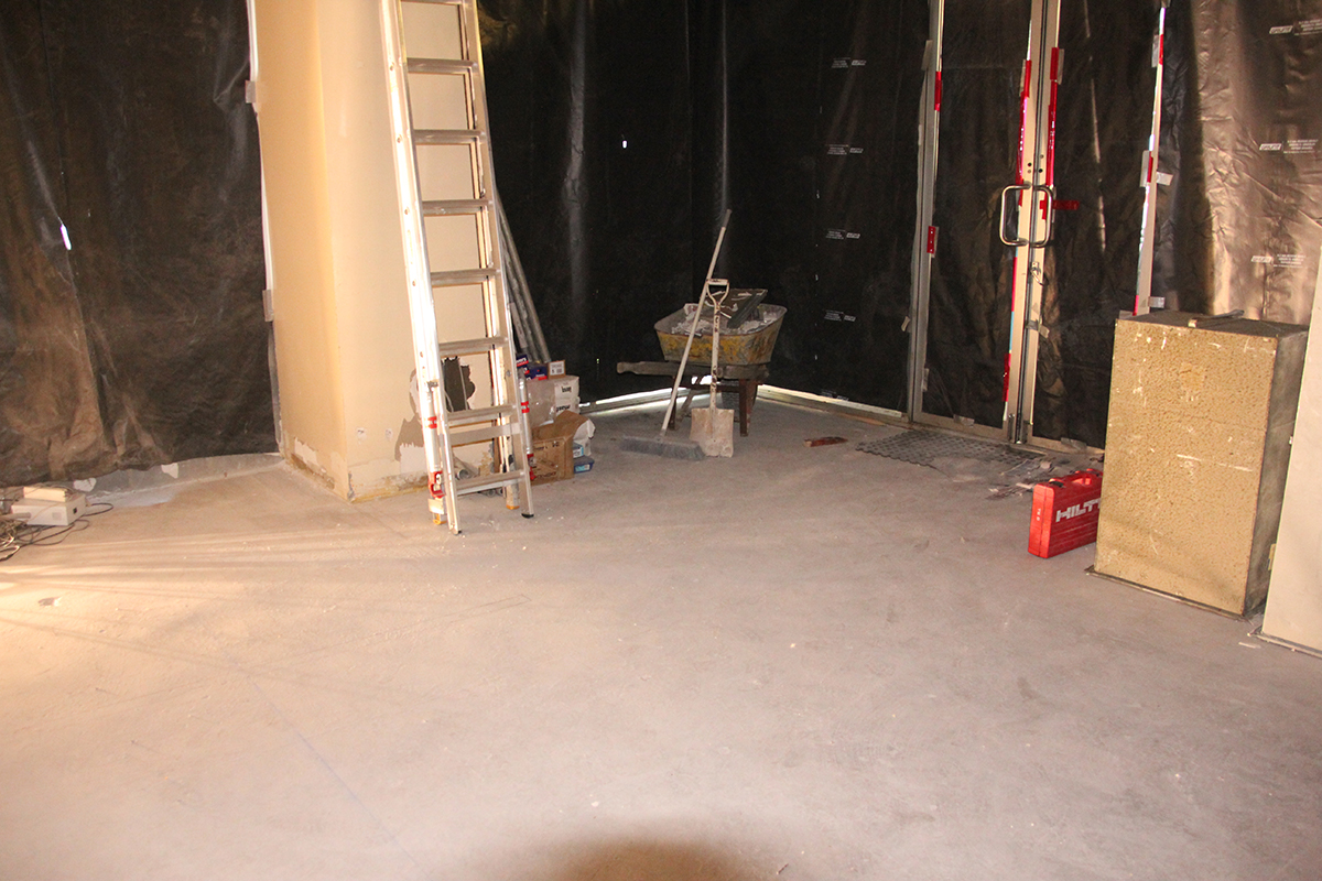 A worksite that hasn't been cleared prior to the resin flooring installation commencing.