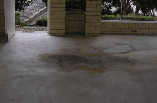 Garage floors often need cleaning first to remove oil and grease.