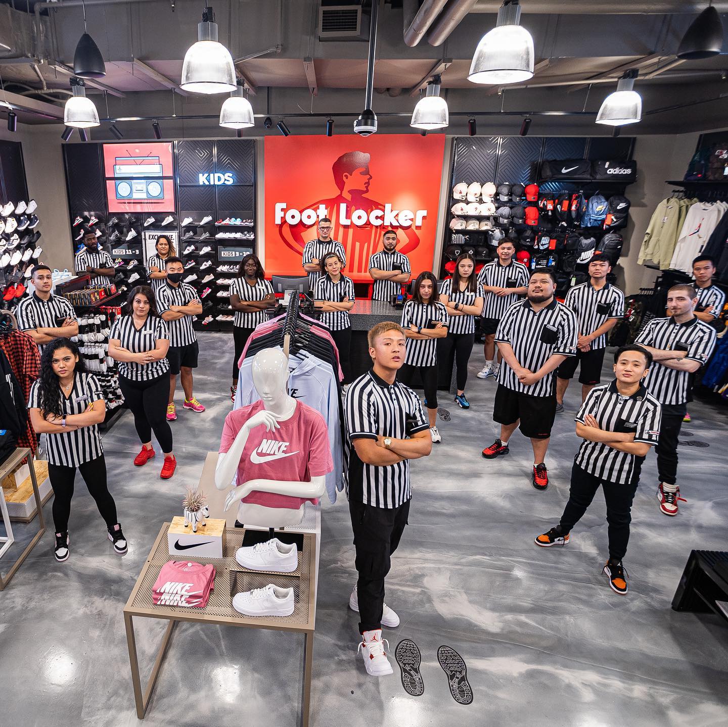 Epoxy supplies from Real World Epoxies used to create a custom floor for Foot Locker.