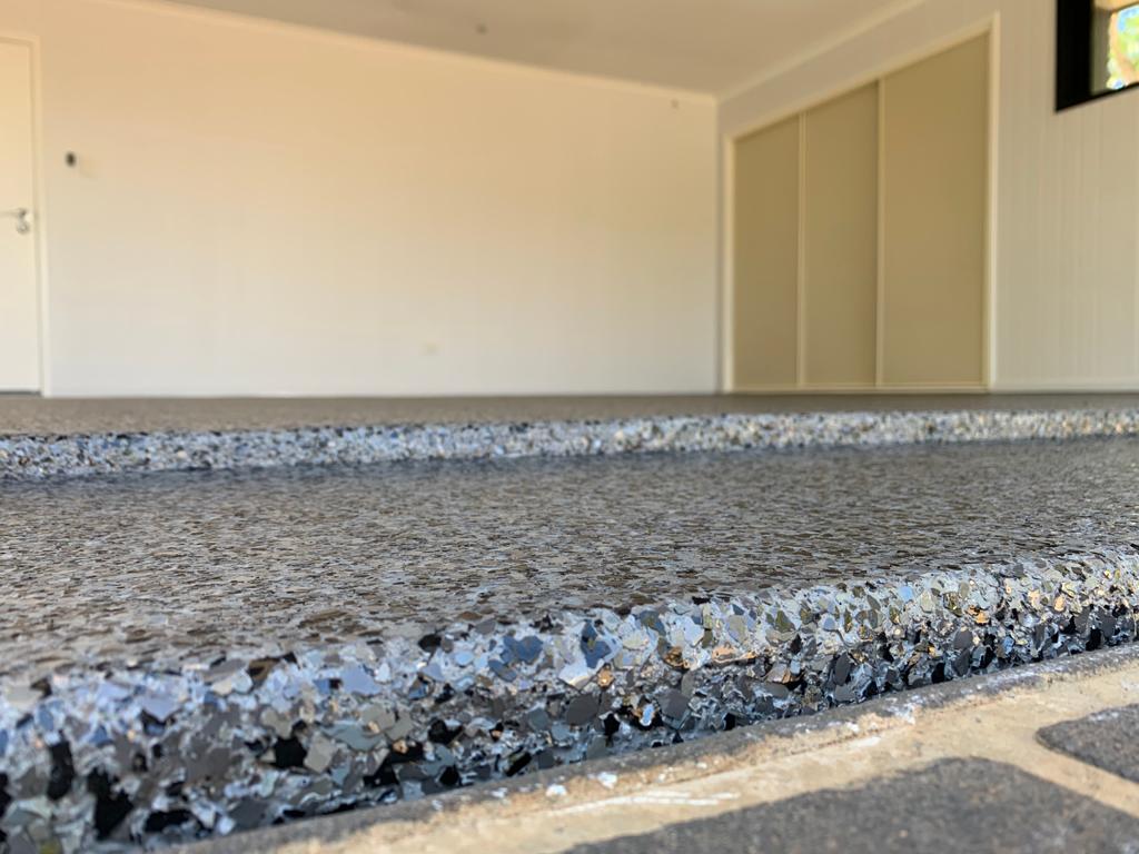 Resin Vinyl flake flooring in a garage.