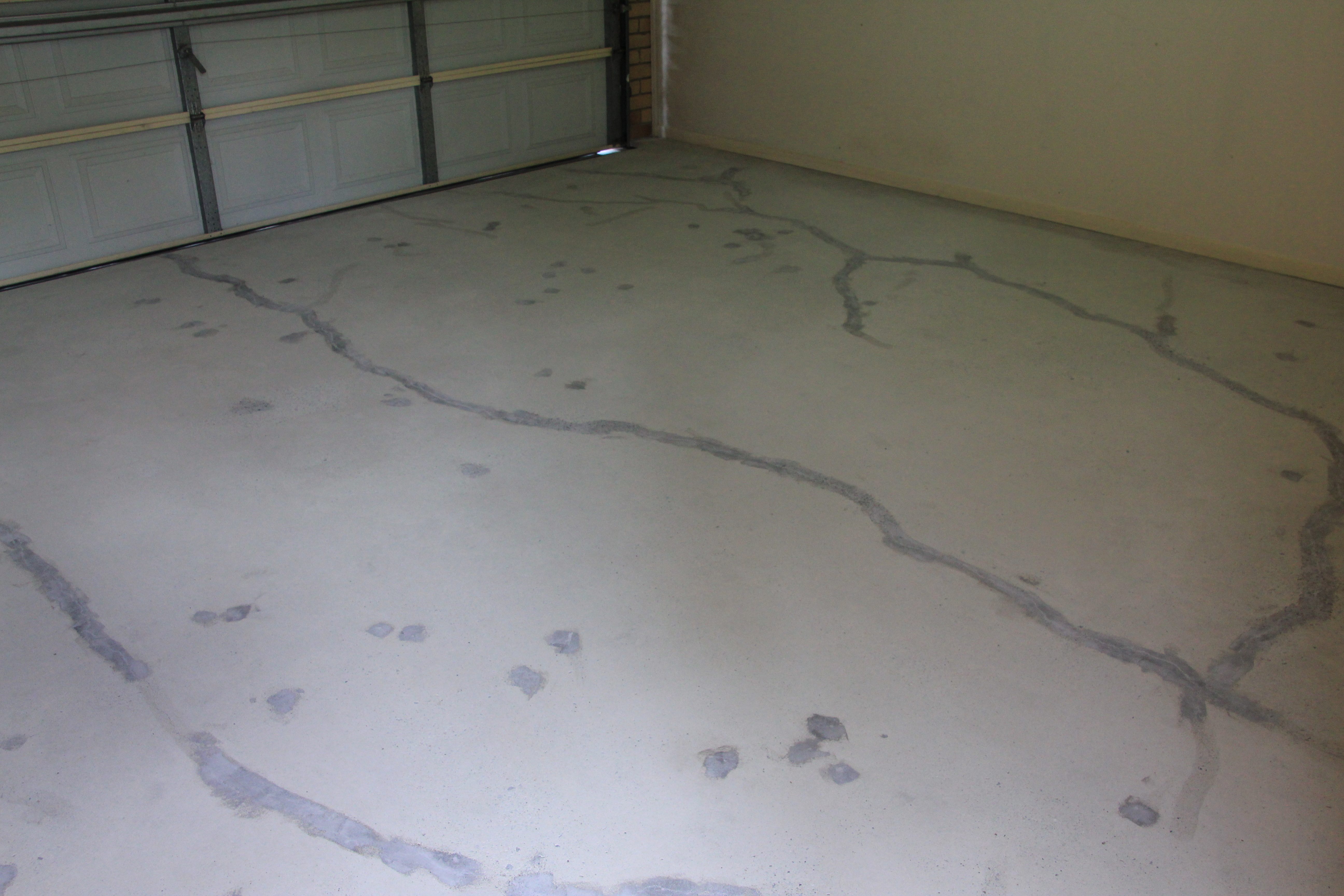 Ezypoxy Clear used as a crack repair compound on a residential garage.