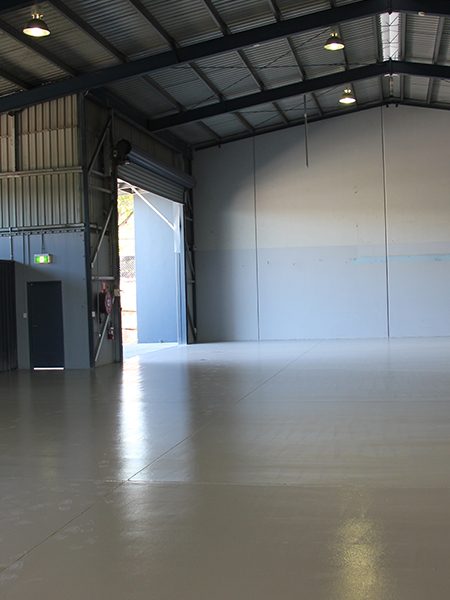 Ezypoxy Rollcoat on the floor of a brand new, 500 square metre warehouse waiting to be used.