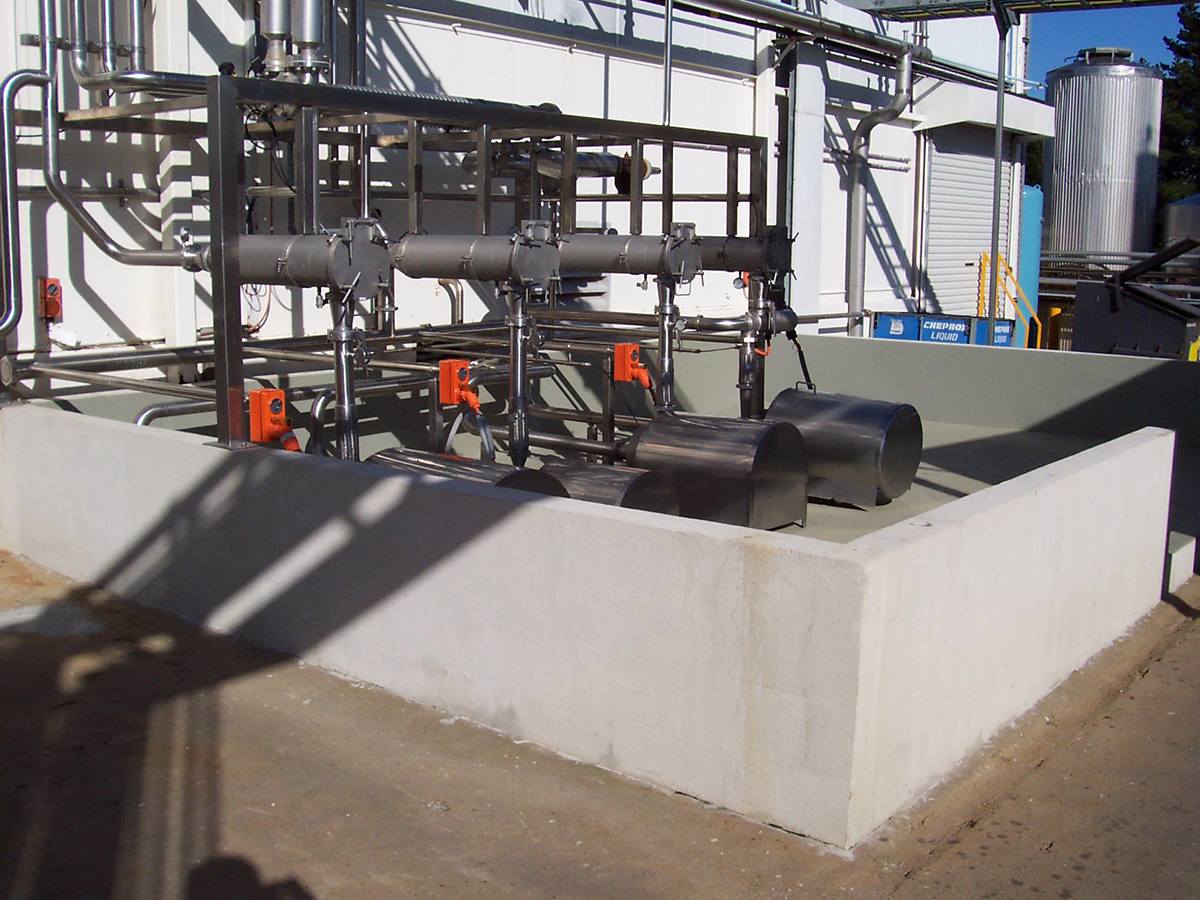 A chemical bund protected with high-chemical resistance Jaxxon coatings.