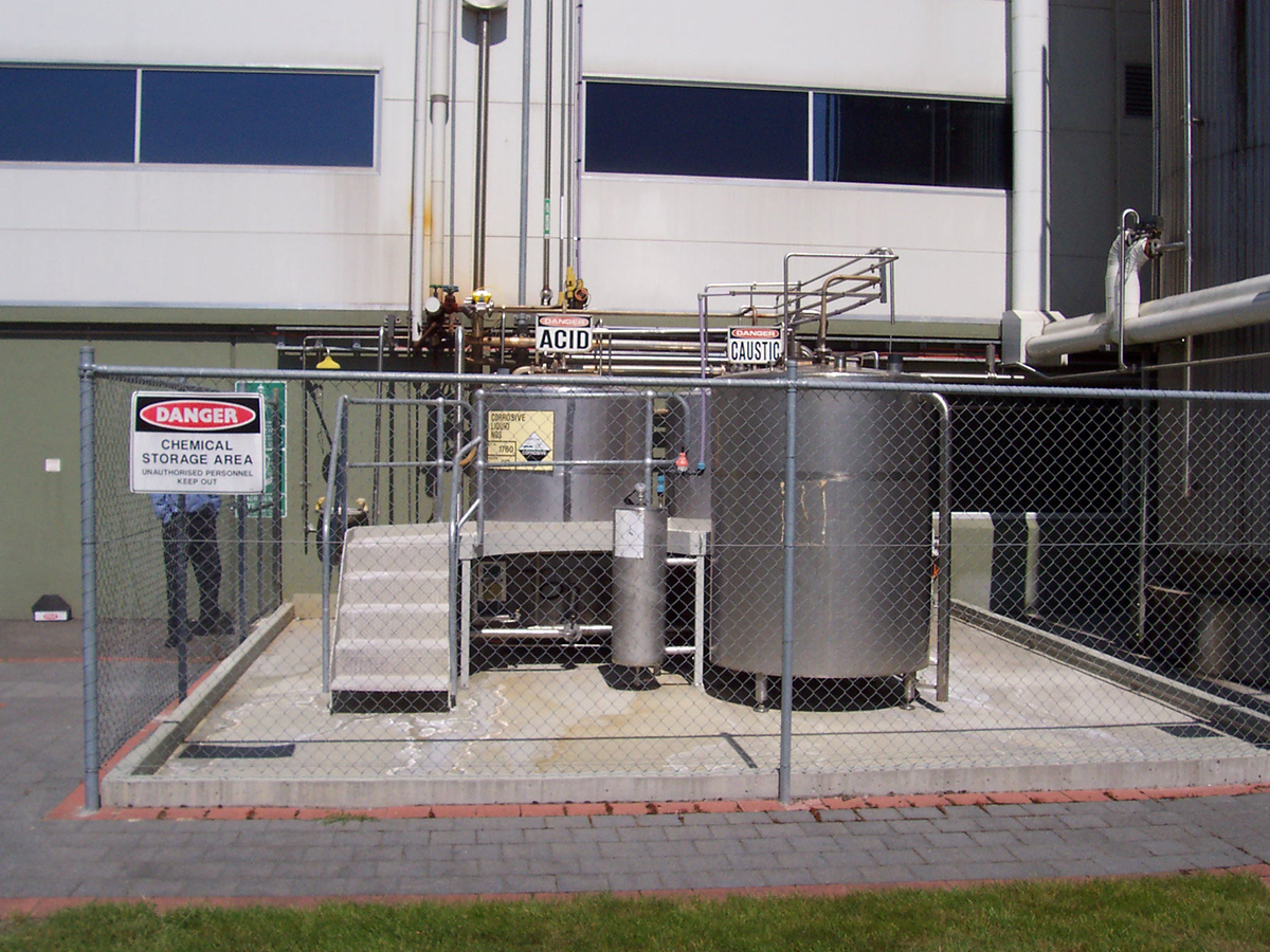 An acid bund on the outside of a chemical processing facility used Jaxxon coatings to protect the concrete.