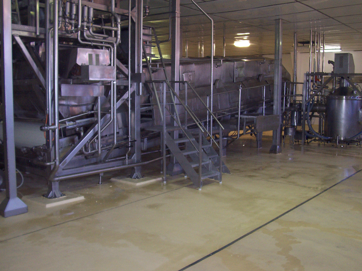 Jaxxon industrial coatings used to protect the floor around processing equipment from aggressive chemicals.