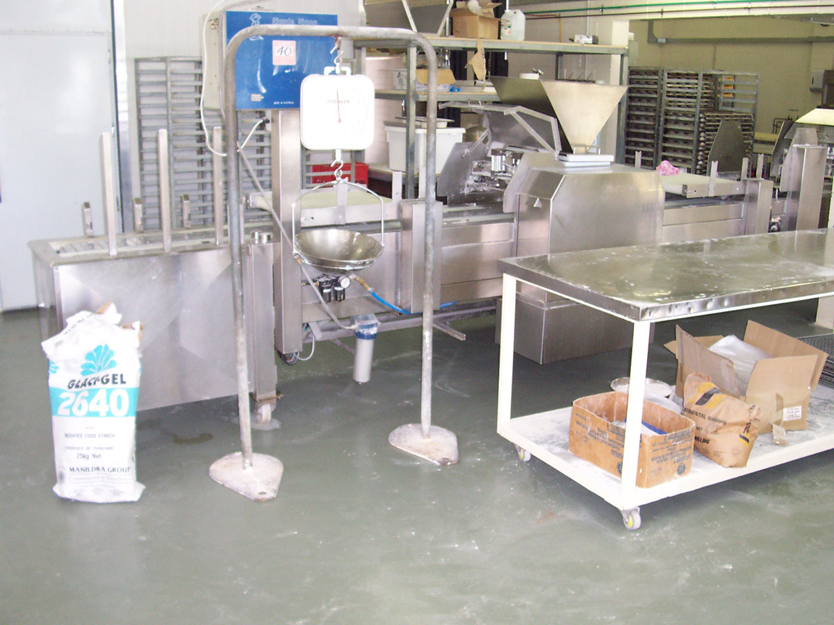 A bakery being returned to service after installing a non-slip floor that used Jaxxon coatings.