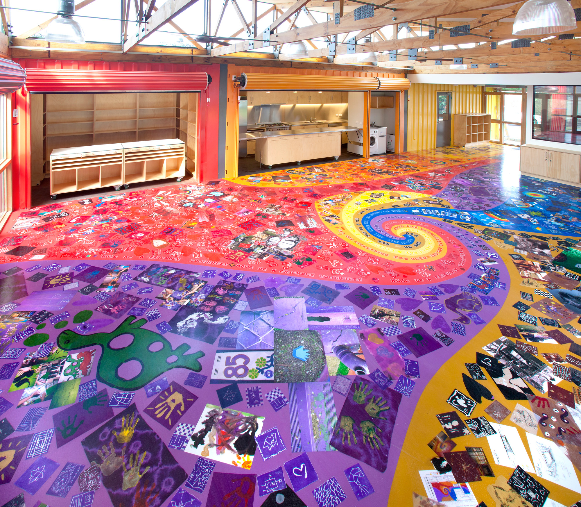 Artepoxy Liquid Crystal used as the topcoat to encapsulate children's artwork on a creative custom floor.