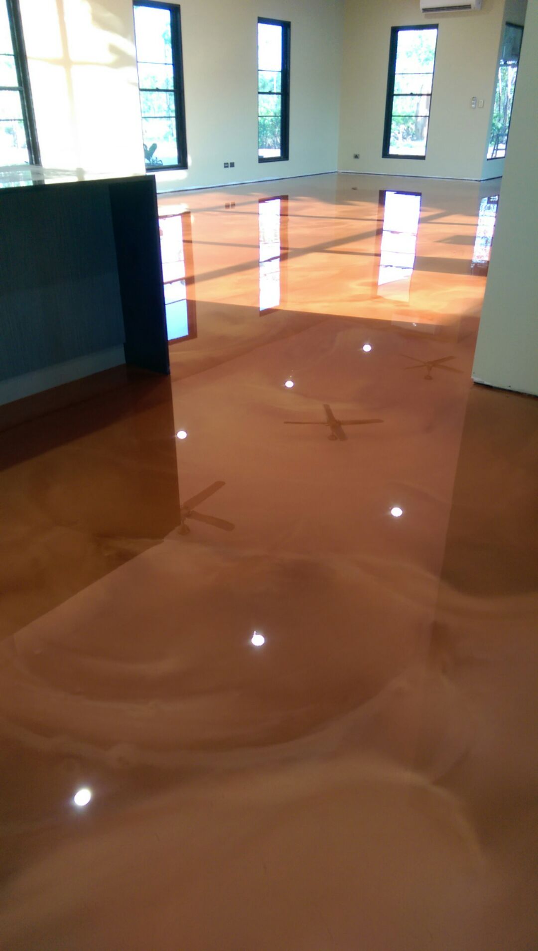 A low-angle shot of a copper metallic finish that was created using Artepoxy Liquid Marble.