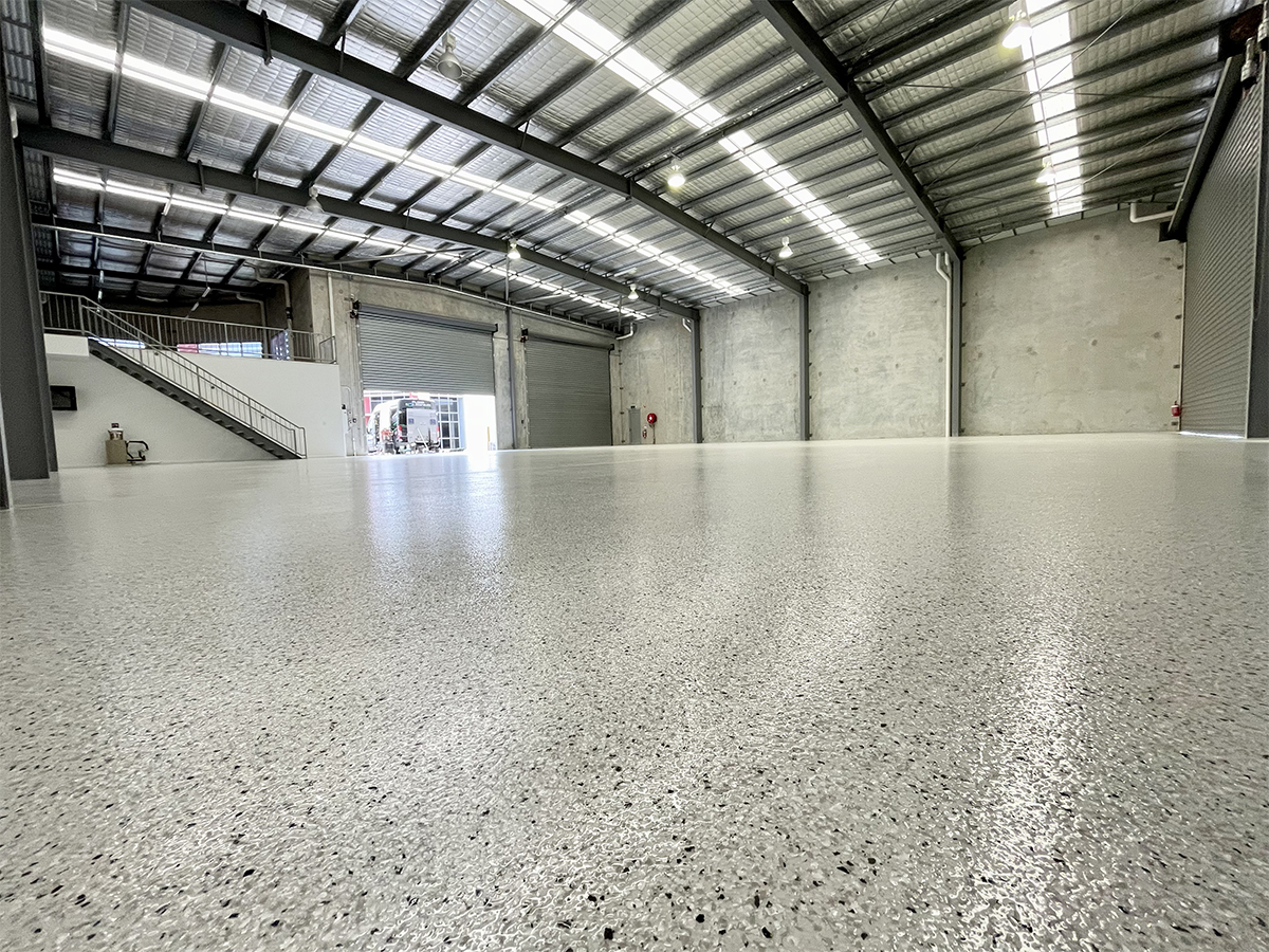 Epoxy flake floor in a commercial warehouse.