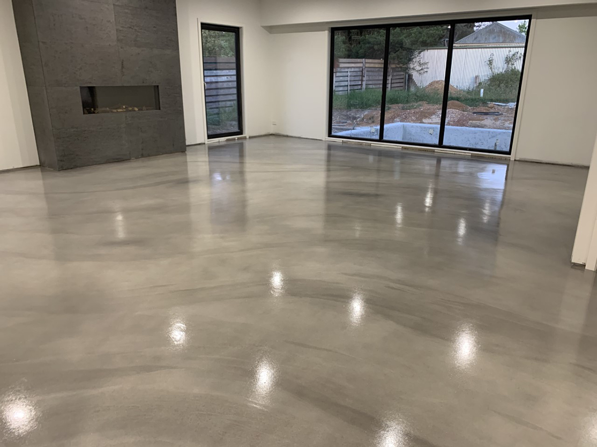 Ezypoly polyurethane with a matted finish on top of a stylish grey floor in a modern residential living room.