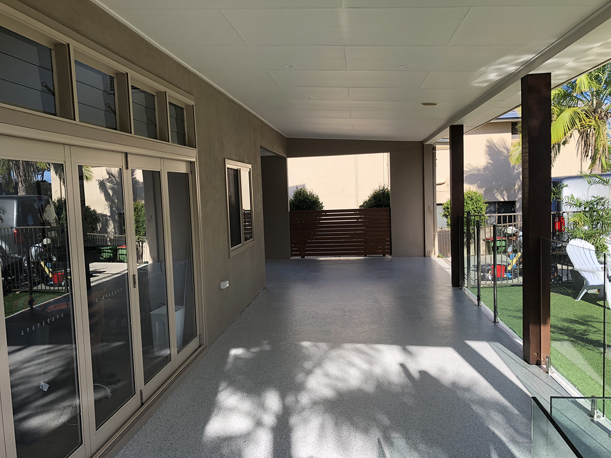 An epoxy flake floor on a residential patio.