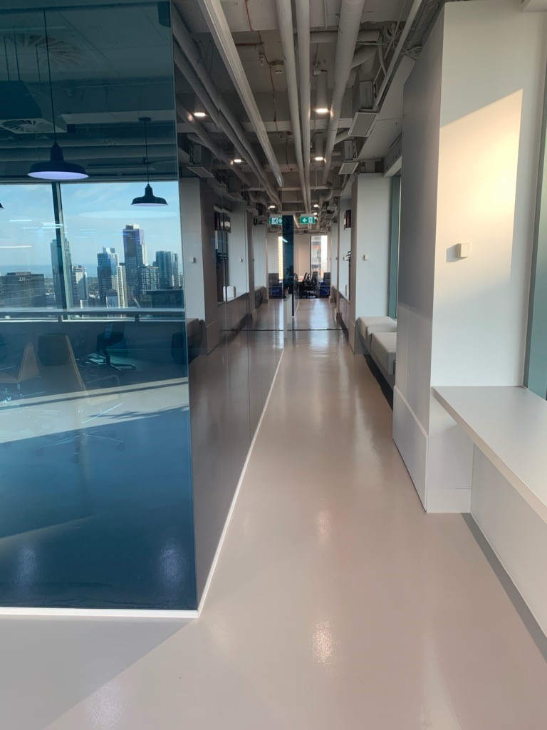 Ezypoly polyurethane with a matted finish used in the hallways and walkways of a city office building.