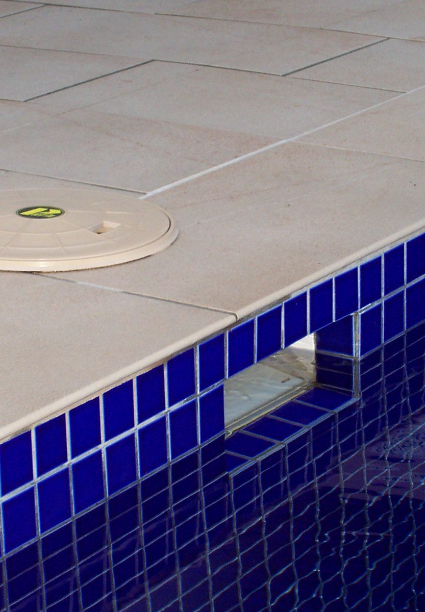 The filter box area in a swimming pool where the vertical tiles were re-attached using Scubapoxy 3725.