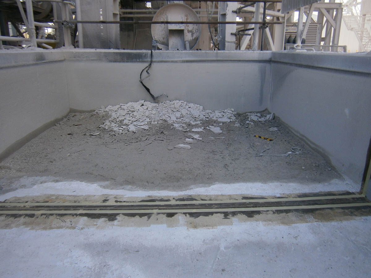 A section of damaged expansion joint in the cooling bath after it had been cleaned out and prepared for re-sealing.