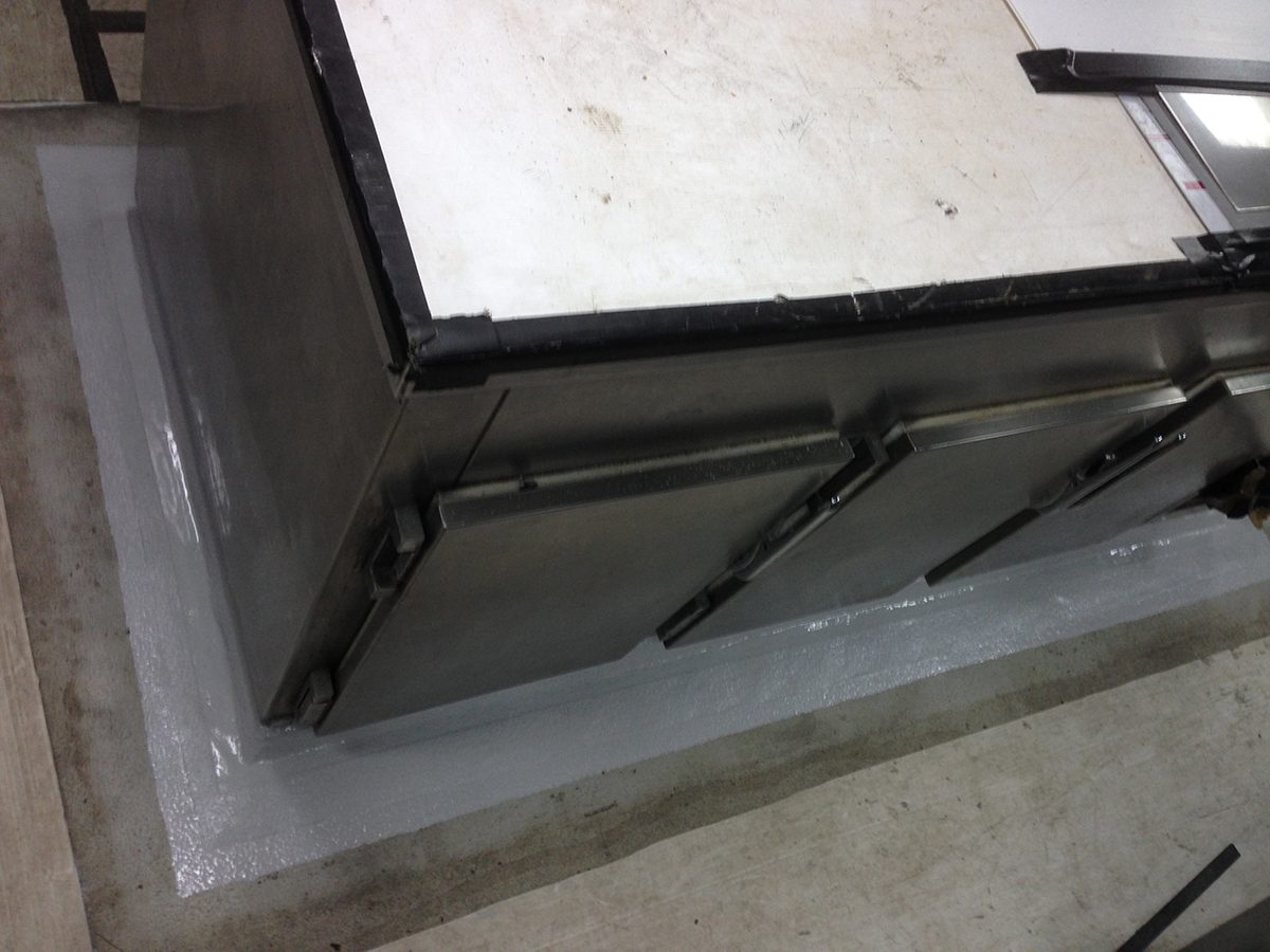 An area around a steel bench in the galley with the WS-100 system restored.