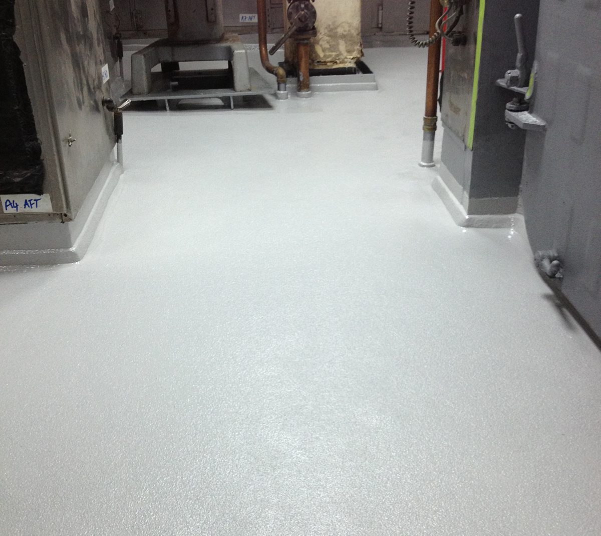 The galley in HMAS Darwin after the WS-100 flooring system had been installed.