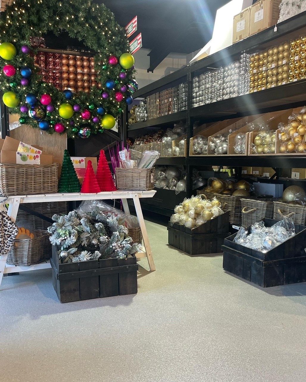 A nice, clean, well-maintained Resin Granite floor in a shop selling Christmas decorations.